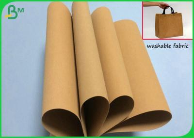 China Water Resistant 0.55MM Thickness Washable Kraft Fabric For Ipad Bag Making for sale
