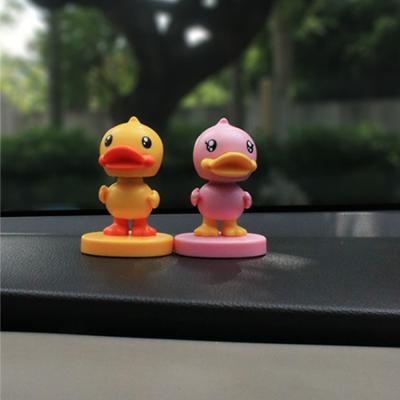 Chine Voiture principale de poupées de secousse en plastique de PVC pour l'ODM d'OEM de tableau de bord de voiture à vendre