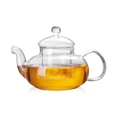 China Chaleira de chá de vidro clara home, bule de vidro resistente ao calor de florescência da folha solta à venda