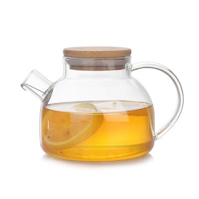 China Large Spout 1000ml Clear Glass Teapot Safe Water Kettle With Bamboo Lid for sale