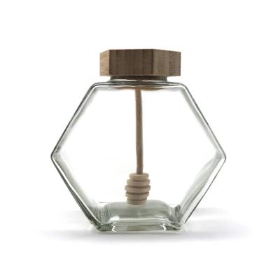 China Empty Hexagon Glass Honey Jar Pot Jar 12oz Capacity Wooden Bamboo Dripper for sale