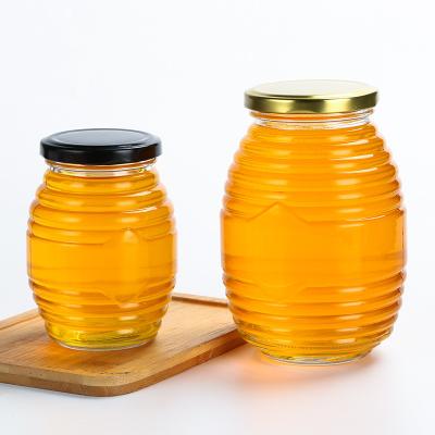 China Bee Shape Little Glass Jars , Fancy Threaded Round Glass Jar With Lid for sale