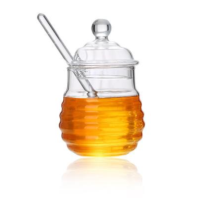China Borosilicate Glass Honey Jar With Dripper Heat Resistant Eco Friendly for sale