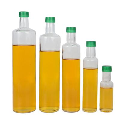 China Envase de cristal de la botella del aceite de oliva de la pared gruesa con el tapón del canalón/del tornillo en venta