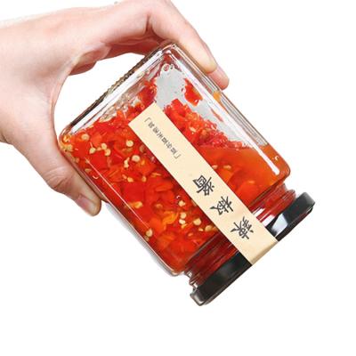 Китай Квадратное форменное стеклянное хранение еды раздражает с материалом стекла соды крышки металла винта продается