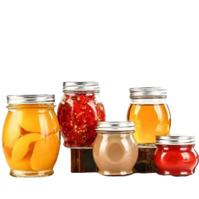 China Food Container Clear Glass Honey Jar With Metal Cover BPA Free Reusable for sale