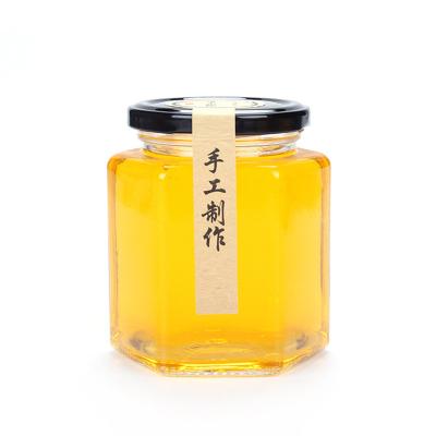 China Handmade Stackable Glass Jam Jar Hexagonal Shape Small For Food Storage for sale
