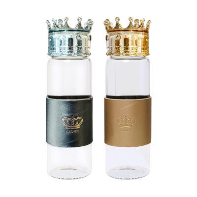 China Heat Resistant 300ml Glass Water Bottle With Crown Lid for sale