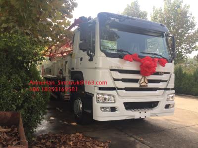 中国 8 x 4トラックによって取付けられる具体的なポンプ トラック機械SINOTRUK HOWO低い消費 販売のため
