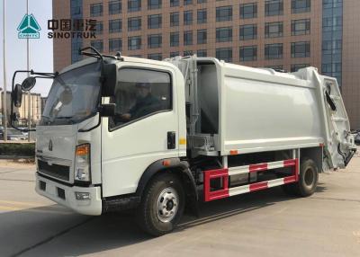 China Euro del camión de basura del acuerdo de Sinotruk Howo 4x2 3 120hp 9cbm sin el durmiente en venta