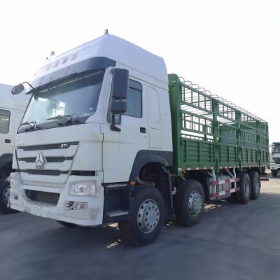 China 60 Tons LHD Manual 8x4 Sinotruk Howo Cargo Truck for sale