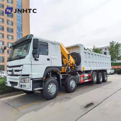 China Howo 16 Wheeler Dump Truck With 10T Foldable Arm Crane With Lifting Axle for sale