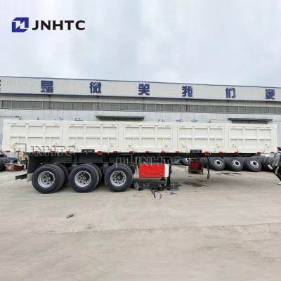 中国 70トンの油圧ひっくり返るトレーラーの頑丈な半トレーラーはダンプ トラックの側面のダンプカーを 販売のため