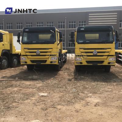 China SINOTRUK Howo Heavy Cargo Truck 35 Tones Flatbed Trailer Tri Axle Flatbed for sale