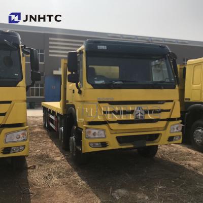 China SINOTRUK 8*4 22-30 Ton Concave Flatbed Transport Truck Excavator Transport Truck for sale