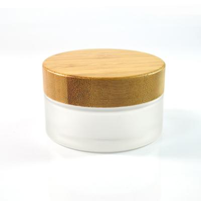 China 1Oz 50ml Bamboo Small Makeup Containers , Round Wooden Cap Cosmetic Cream Jar for sale