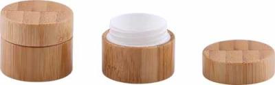 China Vidro geado dos recipientes de creme cosméticos ambientais com a tampa de madeira de bambu à venda