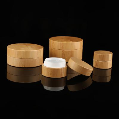 China Plastic Empty Cosmetic Jars With Bamboo All Covered for sale