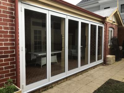 China Inward / Outward Aluminum Folding Doors 1.0mm-2.0mm With Single / Double Glazed Glass for sale