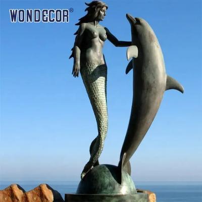 中国 注文の屋外の装飾の有名な実物大の青銅色の人魚のイルカの彫像 販売のため