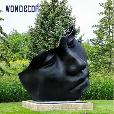 China Customized Outdoor Garden Decoration Large Abstract Face Bronze Statue for sale
