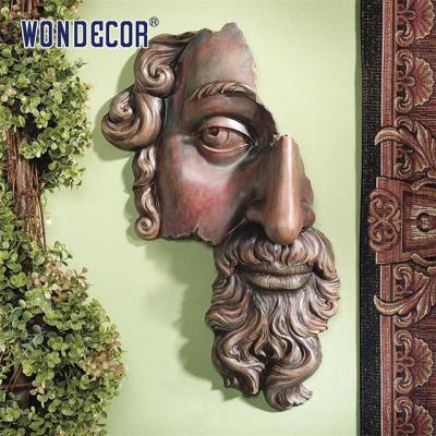 China Missing Face Decoration Outdoor Wall Sculpture High Durability à venda