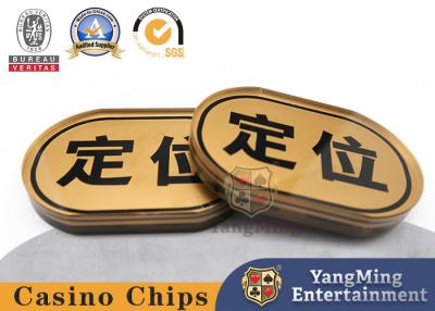 China Gambling Table Dealer Bland Marker Gold Silk Screen Oval Brand Positioning Discard Cards for sale