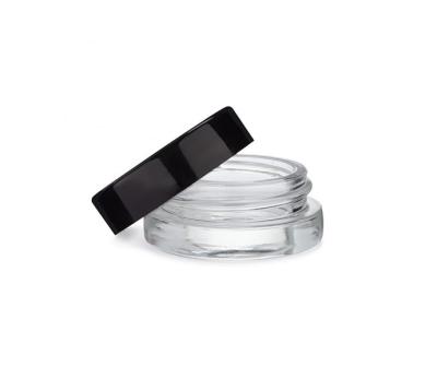 China 7ml Black Cap Glass Concentrate Jar Round Cosmetics Glass Container for sale