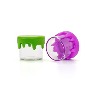 China Cilindro Tarro de vidrio de borosilicato Tapa de silicona 6ml Mini tarros de vidrio a prueba de niños en venta