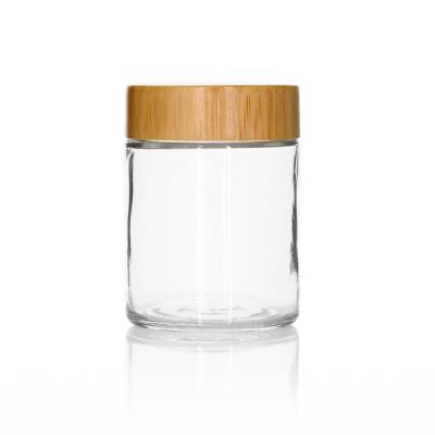 China Frosted Child Resistant Bamboo Lid Glass Container Cosmetic 3oz for sale