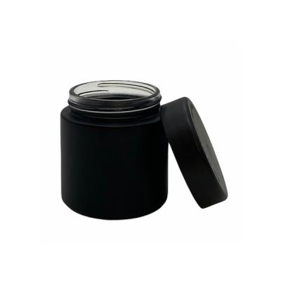 China Frascos de vidro preto fosco flor grau alimentício proteção UV 60 ml frascos de vidro com tampas à venda