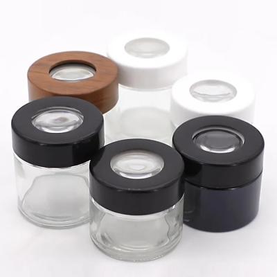 China Custom Clear Magnifying Spice Airtight Glass Jar 2oz 3oz 4oz With Child Resistant Lid à venda