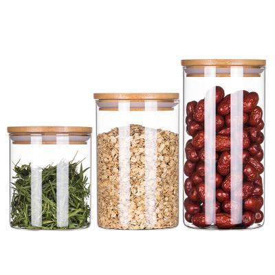 China 500Ml 300Ml 1000Ml Kitchen Storage Glass Bamboo Lid Jar Airtight Dry Food Suction for sale