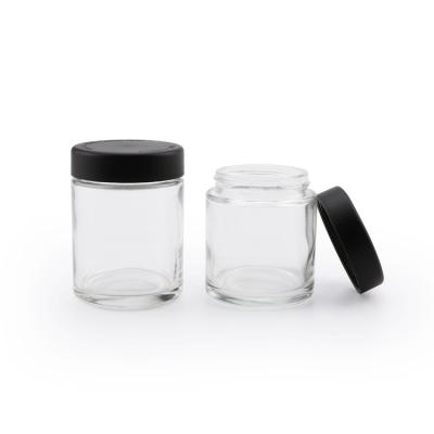 中国 3oz Child Resistant Glass Jars With Black Caps 販売のため