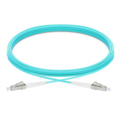 China Envoltura con varios modos de funcionamiento del PVC del adaptador del cordón de remiendo de la fibra óptica OM3 LC LC en venta