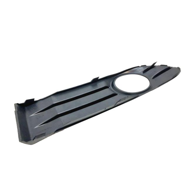 Close-up of WOMALA fog light cover mounting clips and structural details