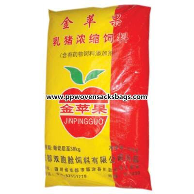 中国 リサイクルされた赤および黄色はブタの供給/肥料/米の包装のための PP によって編まれた袋を薄板にしました 販売のため