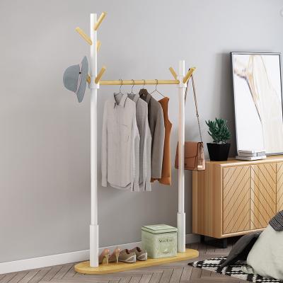 China Bedroom Bamboo Frame Coat Rack Hanger Stand With Laundry Basket for sale