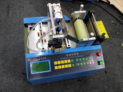 China Hook Loop Elastic Automatic Webbing Cutting Machines With Hole Making Function for sale