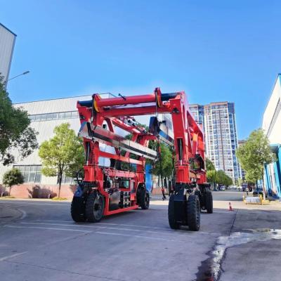 China SPEO Red Straddle Container Lifter Machine For Steel Factories / Precast Concrete for sale