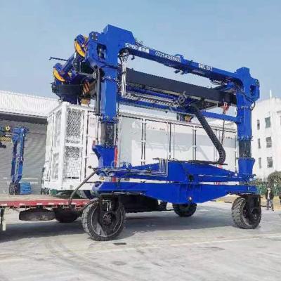 China Q355 Steel Electric Straddle Carrier Hydraulic Lifting Vehicle Container Handling Car for sale