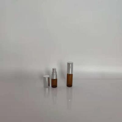 China 3ml 5ml 10ml 12ml 15ml amber glass vials with silver aluminum mist spray for perfume for sale