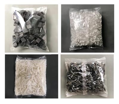China Manual Feeding Sealing Packing Machine Bag OEM Chain Bucket Type for sale