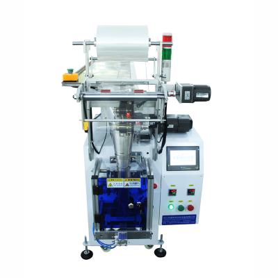 China Manual Feeding Vertical Flow Pack Machine Semi Automatic Packaging for sale