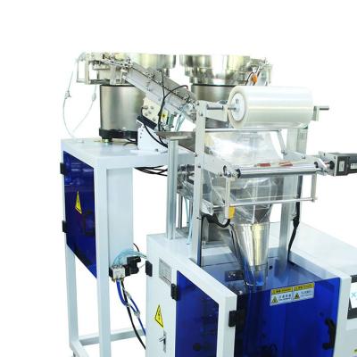 China Double Disc Screw Packaging Machine Weighing Screening Accurate Counting for sale