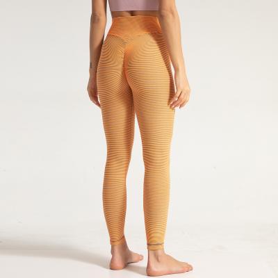 China Ins Peach Striped Seamless Fitness Tights High Waisted Yoga Pants for sale