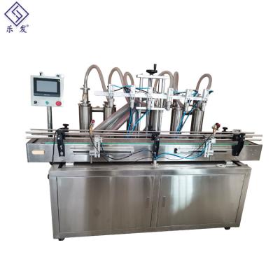 China tipo linear líquido automático de la máquina de rellenar de la botella 100ml para la cerveza en venta