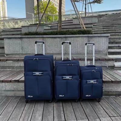 China Fixed Casters Fabric Luggage Bag Multifunctional Polyester Material for sale