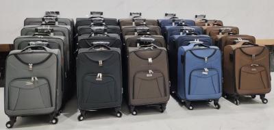 China Polyester Medium Fabric Suitcase On Wheels Shockproof Multiscene for sale