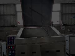 Rotating basket spray cleaning machine